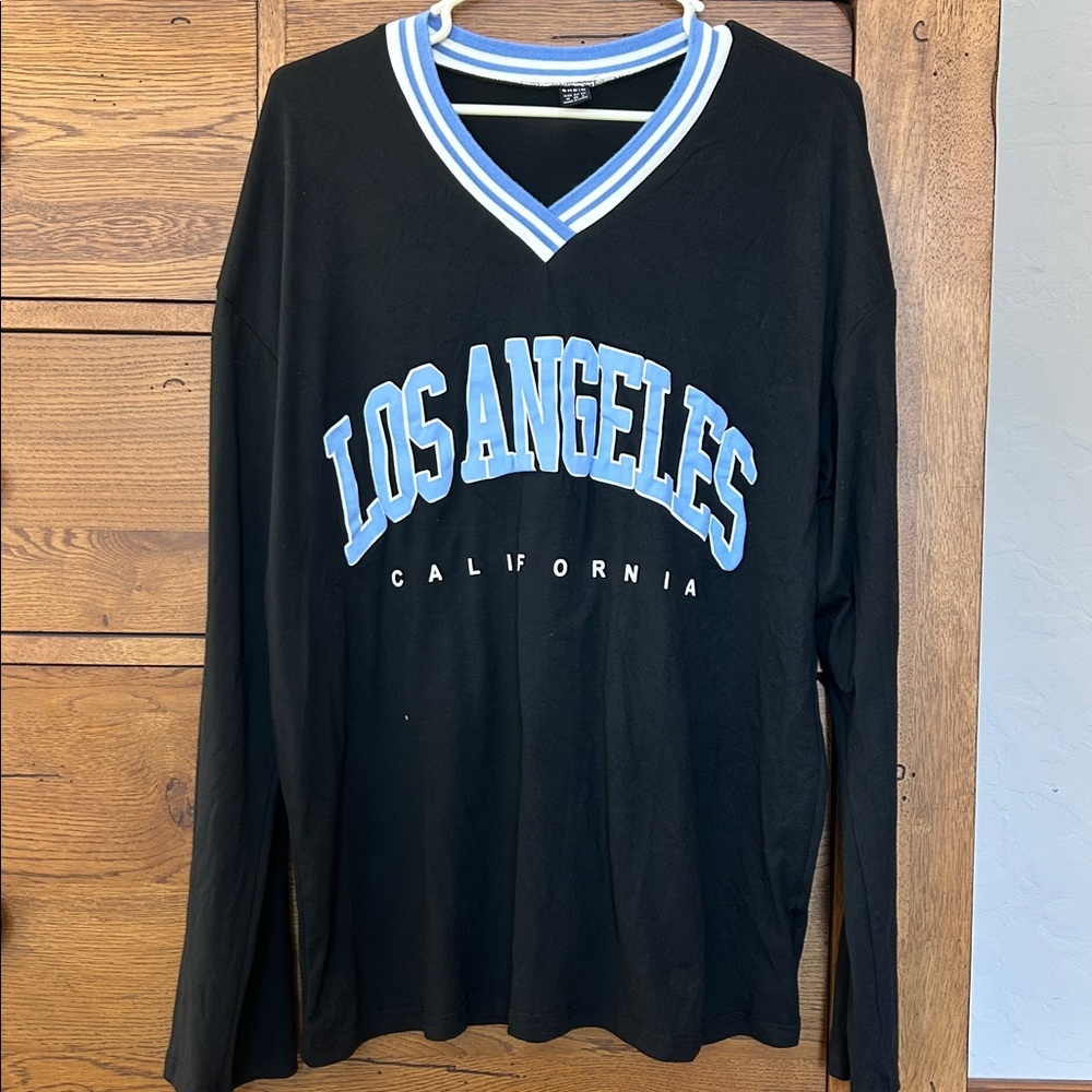 SHEIN Black Shirt with Blue and White Striped Collar